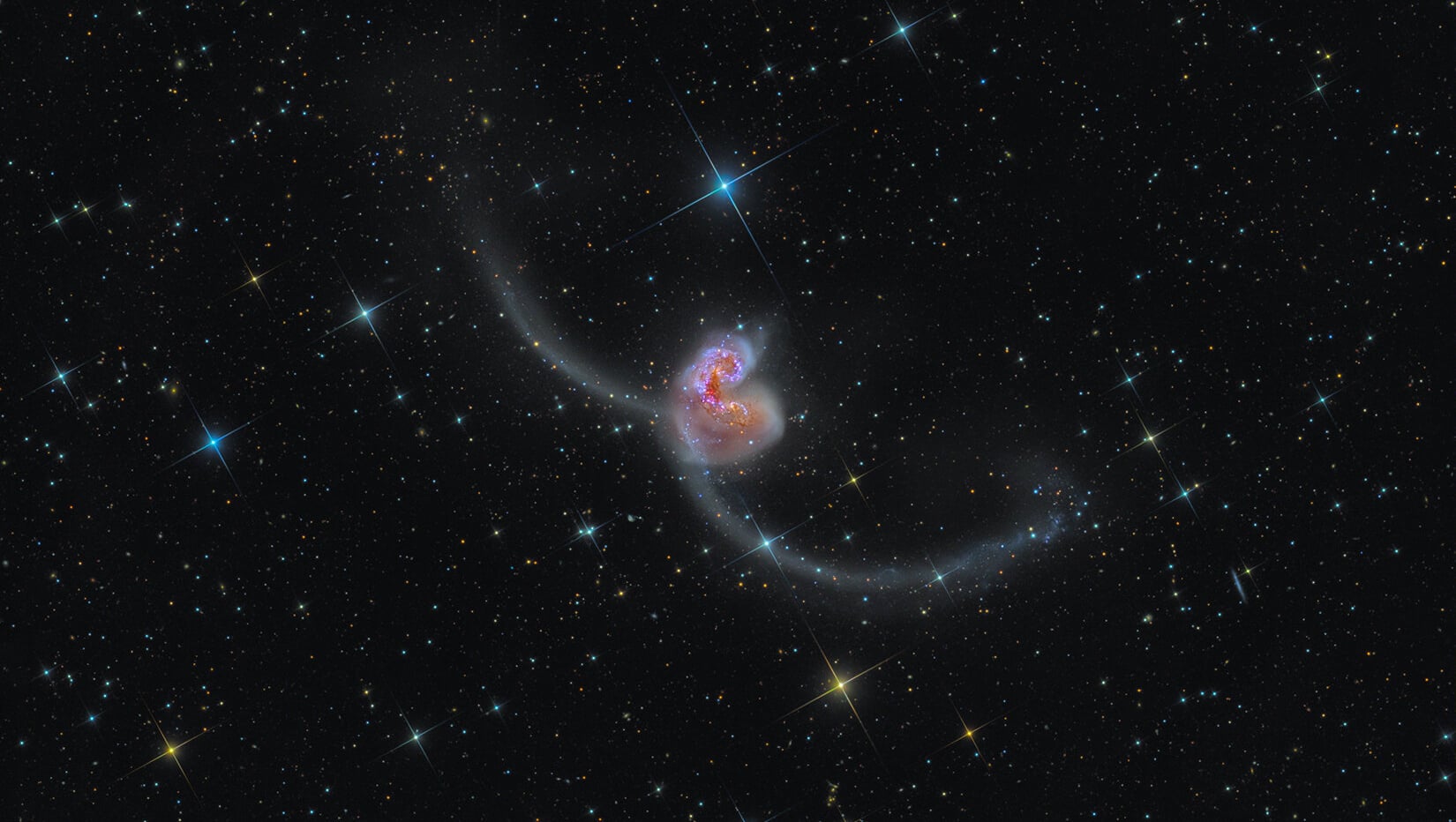 NGC 4038 & NGC 4039: Evrenin Görkemli Kavuşması - Evrim Ağacı